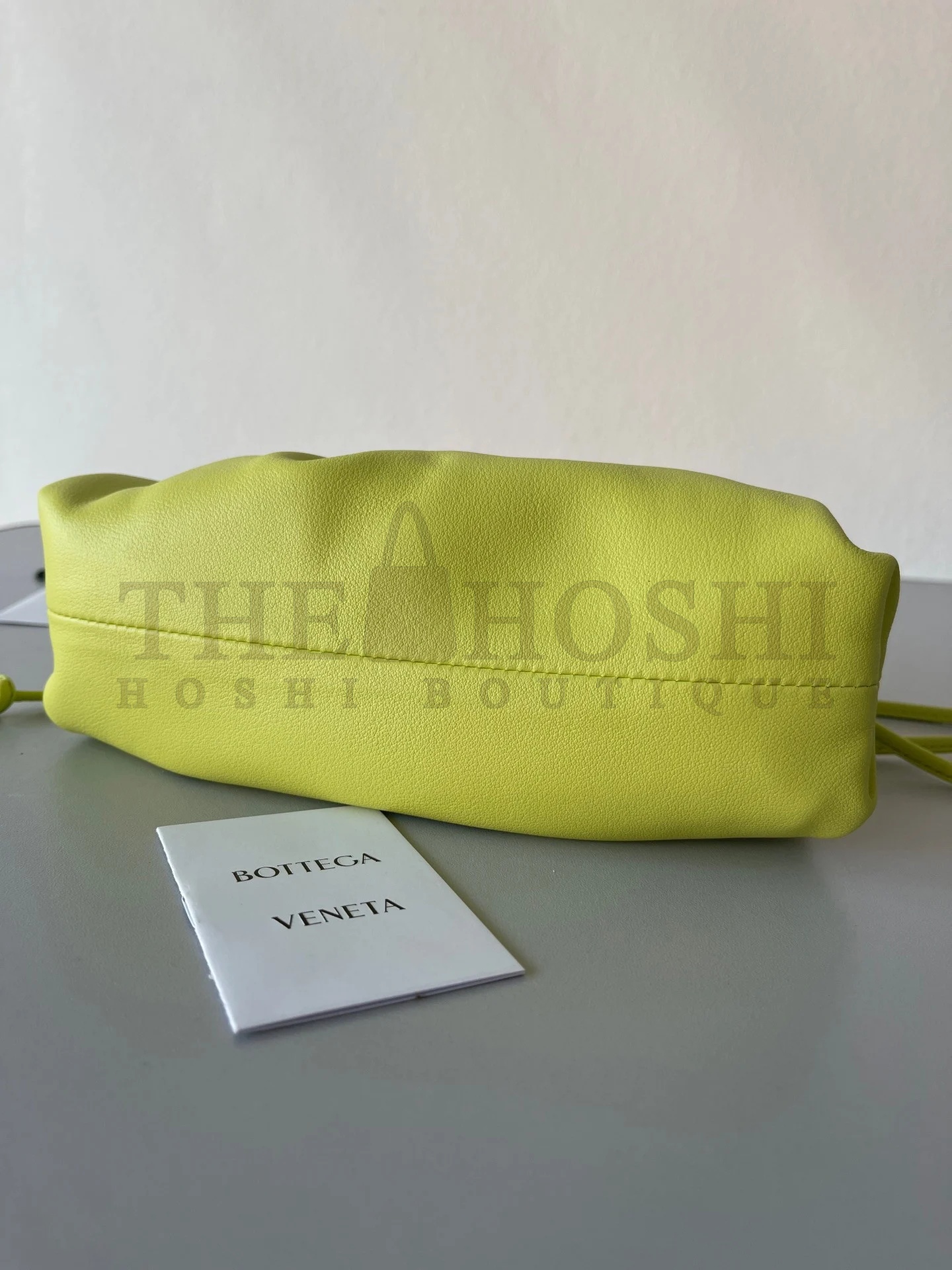 B0tt*ga Ven*ta Mini Pouch with Strap in Kiwi Calfskin Master Quality