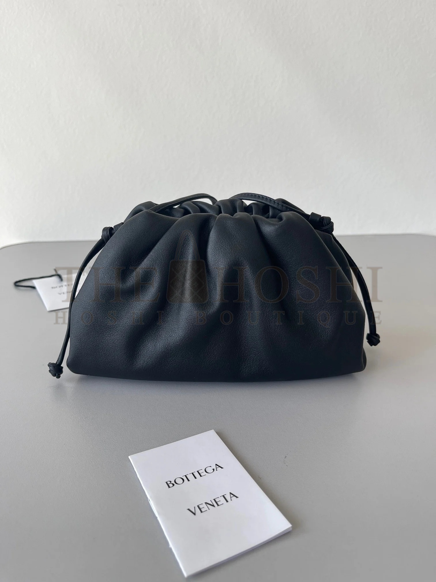 B0tt*ga Ven*ta Mini Pouch with Strap in Black Calfskin Master Quality